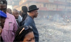 Rivers State Governor, Rt. Hon. Chibuike Rotimi Amaechi (2nd right), with other government officials inspecting the ruins of the Rumuwoji(Mile One)Market which was gutted by fire early yesterday morning in Port Harcourt.