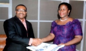 General Manager, RSNC, Mr Celestine Ogolo, presenting some copies of The Tide newspaper to Founder, Rainbow Book Club and Director, World Book Capital 2014, Mrs Koko Kalango, during her courtsey visit to the corporation, yesterday.