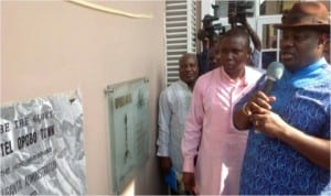 Rivers State Deputy Governor, Engr Tele Ikuru(right), who represented the governor, Rt Hon Chibuike Amaechi, at the commissioning of Opubo Hotels in Opobo Town, speaking after unveiling the plaque to declare the hotel open, yesterday.