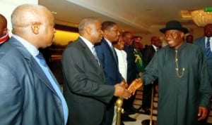 President Goodluck Jonathan (right) being received by some Nigerians on his arrival at the Intercontinental Hotels, Central London, recently.