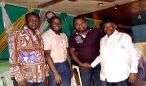 Chairman, Rumuwoji Community, Hon Emmanuel C. Orlu (2nd right), in a handshake with Treasurer of the community,  Chief Emmanuel Nti-Woji (right), shortly after the inauguration of the community’s executive committee members last Saturday. With them are  Secretary, Ike Wigodo (left) and Vice Chairman, Azubuike A.  Nsiegbe.