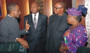 L-R: Governor of Central Bank of Nigeria, Malam Sanusi Lamido, Deputy Governor, Mr Kingsley Moghalu, Governor Peter Obi of Anambra State and the Minister of Finance, Dr Ngozi Okonjo-Iweala, at a meeting of the Economic Management Team in Abuja, last Monday.