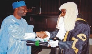 Governor Ibrahim Dankwambo of Gombe State (left), presenting the 2014 Appropriation Bill (Budget) to the Speaker of the State House of Assembly, Alhaji Inuwa Garba, in Gombe, last Friday.