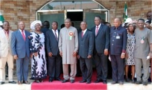 President Goodluck Jonathan (middle), Minister of Police Affairs, Retired Navy Capt. Caleb Olubolade (right) and some leaders of the Apostolic Faith Church, during ‘Last Sunday of the Year's Church Service’ at Apostolic Faith Church, Regional Headquaters, Jabi, Abuja, yesterday.