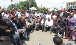 Members of Rivers State House of Assembly, holding their meeting on Moscow  Road as security operatives allegedly stopped them from gaining entrance into the Assembly Complex in Port Harcourt.
