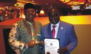 Dr James Walls Mayor of Maryland and the President of US Mayors' Conference presenting award to DG NAFDAC, Dr. Paul Orhii at a ceremony in Milwaukee, USA