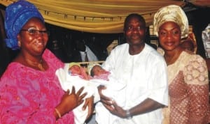 L-R: Wife of Lagos State Governor, Mrs Abimbola and Lagos State Commissioner for Health, Dr Leke Pitan, Carrying a set of twins deliverd by Mrs Adediji as first babies of the Year 2014 at the Island Hospital in Lagos last Wednesday. With them is the Special Adviser to the Governor on Public Health, Dr Yewande Adesina.