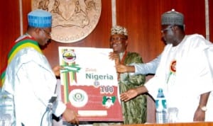 President Goodluck Jonathan (left), receiving a centenary greeting card from the national president, Road Transport Employer's Association of Nigeria (rtean), Chief Musa Shehu, during the visit of rtean executives to the Presidential Villa in Abuja on Friday. With them is the Minister of Transport, Sen. Idris Umar. Photo: NAN