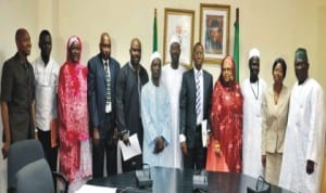 Permanent Secretary, Federal Ministry of Environment, Mr Taiye Haruna (5th l), with members of  Programme Implementation of the Great Green Wall project at their  inauguration ceremony in Abuja recently.