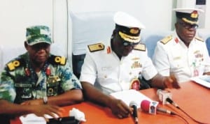 L-R: Commodore Muhammed Garba, Rear Adm. Sidi-Ali Usman and Commodore V. Okeke, addressing a news conference in Warri last Monday.