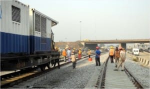 Construction workers at Mile 2 as work resumes in Lagos, last Thursday.