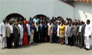 Rivers State Governor, Rt. Hon. Chibuike Rotimi Amaechi (middle), flanked (right) by the Speaker, Rivers State House of Assembly, Rt. Hon. Otelemaba Dan-Amaechree in group photograph with members of Rivers State House of Assembly, and other top government officials.