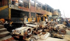 An aftermath of a fire incident which razed several shops, offices, vehicles and equipment at Olodi Apapa in Lagos, recently.