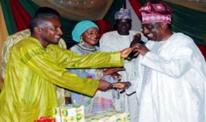 Acting Managing Director, Kaduna Refining and Petrochemical Company, Dr Bafred Ejugu (left), presenting a send off gift to his predecessor, Mr Bolanle Ayodele, during the send off party for Ayodele in Kaduna, recently. Photo: NAN