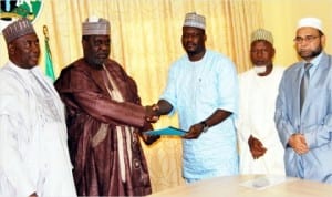 Deputy Governor of Bauchi State, Alhaji Sagir Saleh (2nd left), receiving an MOU from Managing Director, Arewa Cotton and Allied Products Limited, Mr Anibe Achimugu, at the agreement signing between Bauchi State Government and Arewa Cotton in Bauchi last Friday. With them are, Bauchi State Commissioner for Agriculture, Alhaji Mohammed Tasiu (left), State Chairman, National Cotton Association of Nigeria (NACOTAN), Alhaji Baba Misau (2nd right) and General Manager, Arewa Cotton, Abdul Mansoori. Photo: NAN