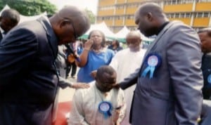 Officiating Ministers dedicating the State Civil Service through the Chairman, Civil Service Commission, Sir Ngo Martyns-Yellowe (kneeling), at the 2014 prayer/dedication service in Port Harcourt recently.
