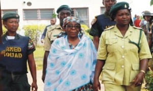 Former Oyo State Head of Service, Alhaja Kudirat Adeleke (middle), coming out of the State High Court on alleged pension fraud case in Ibadan last Friday.