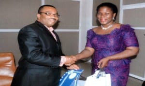 General Manager, Rivers State Newspaper Corporation, Mr Celestine Ogolo receiving sourenir from the Director Port Harcourt World Book Capital, Mrs Koko Kalango, who paid a courtesy visit to the corporation, recently. Photo: Ken Nwiueh 