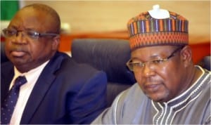 Minister of State for Finance, Dr Yerima Ngama (right), briefing newsmen after Federation Accounts Allocation Committee's meeting in Abuja, yesterday. With him is the Accountant-General of the Federation, Mr Jonah Otunla.