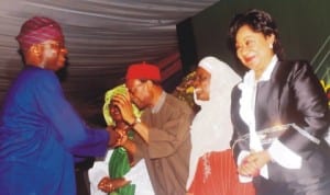 L-R: Governor Babatunde Fashola of Lagos State, exchanging pleasantries with  former Secretary-General of Commonwealth, Chief Emeka Anyaoku, former Deputy Governor of Lagos State, Alhaja Latefat Okunnu and former Minister of Commerce and Industry, Mrs Onikepo Akande, at the 7th Taxation Conference in Lagos, yesterday. Photo: NAN