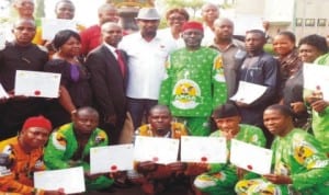 New chairman, Nnewi South Lga, Chief Ossy Iyiegbu (5th right), outgoing chairman, Mr Chieloka Okoye (4th left), deputy chairman, Mr Okey Abazu (3rd left) and newly sworn-in councilors in Ukpo, Nnewi South, Anambra State, last Wednesday. Photo: NAN