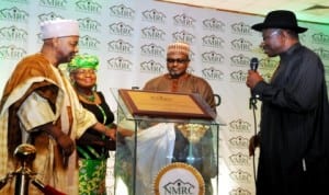 L-R: Vice President Namadi Sambo, Minister of Finance, Dr Ngozi Okonjo-Iweala, Supervising Minister of Lands, Housing and Urban Development, Mr Musa Sada and President Goodluck Jonathan, launching the Nigeria Mortgage Refinance  Company at the State Banquet Hall, Presidential Villa in Abuja last Thursday.
