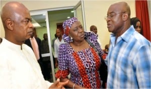 L-R:Chaplain, St. Mulumba Catholic Chaplaincy, Rev. Fr. Innocent Jooji, former Minister of State for Defence, Erelu Olusola Obada, consoling Senate President, David Mark, during the service of songs for his late sister, Mrs Mary Onmamark-Adakole, in Abuja, last Thursday