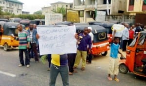 Commercial tricycle operators protesting over alleged multiple taxation by Local Government Councils in Akwa Ibom State, yesterday.