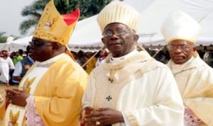  R-L:Papal Nuncio, Most Rev. Augustine Kasujja, out-going Archbishop of Ibadan, Most Rev. Felix Alaba Job, and new Archbishop of Ibadan, Most Rev. Gabriel Abegunrin, at the installation of new Catholic Archbishop of Ibadan, last Friday 