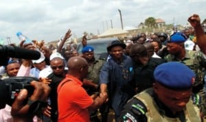Rivers State Governor, Rt Hon. Chibuike Rotimi Amaechi in a handshake with members of Save Rivers Movement at a rally organised by the body in Bori, headquarters of Khana LGA. last Saturday. Photo: Samson Egberi