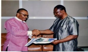 General Manager, Rivers State Newspaper Corporation, Mr Celestine Ogolo (left), presenting copies of The Tide newspaper to President, Association of Rivers State Pubishers, Eddie Williams, during the association’s coutesy visit to the corporation, recently. Photo: Prince Obinna Dele