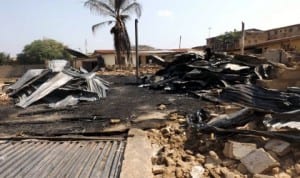 Debris from a warehouse gutted by fire in Omu-aran, Kwara State, last Monday.