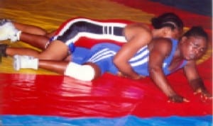 Female  wrestlers struggling for honours during a national tournament in Port Harcourt, Rivers State recently