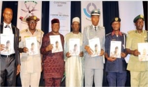 L-R:Chairman, Board of Trustees, Association of Nigerian Licensed Customs Agents, Chief Henry Njoku, Comptroller-General, Immigration, Mr David Paradan, member,House Committee on Diaspora Affairs, Rep. Jerry Alagbaoso, Deputy Comptroller-General of Customs, Dr Manassah Jatau, representative of  Comptroller-General of Customs, DCG John Atte, Commandant-General of NSCDC, Dr Ade Abolurin and Controller-General of Prisons, Mr Zakari Ibrahim, launching Naija Customs Magazine at the International Customs Day in Abuja, last Monday
