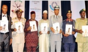 L-R:Chairman, Board of Trustees, Association of Nigerian Licensed Customs Agents, Chief Henry Njoku, Comptroller-General, Immigration, Mr David Paradan, member,House Committee on Diaspora Affairs, Rep. Jerry Alagbaoso, Deputy Comptroller-General of Customs, Dr Manassah Jatau, representative of Comptroller-General of Customs, DCG John Atte, Commandant-General of NSCDC, Dr Ade Abolurin and Controller-General of Prisons, Mr Zakari Ibrahim, launching Naija Customs Magazine at the International Customs Day in Abuja, last Monday