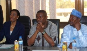 Chairman, House Committee on Petroleum Resources (Downstream), Hon Dakuku Peterside (middle) and Dep Chairman, Hon Yusuf Shittu Galambi (right) listening to a presentation by the Executive Secretary Petroleum Equalisation Fund (PEF), Mrs Adefunke Sharon, during an oversiste visit to PEF, recently