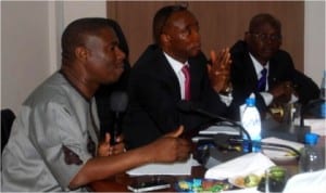 Chairman, House Committee on Petroleum Resources (Downstream), Hon. Dakuku Peterside (with mic), Executive Secretary, Petroleum Products Pricing Regulatory Agency (PPPRA), Reginald Stanley and AGM-Administration, Moses Mbaba, during an oversight visit to PPPRA, recently.