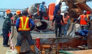Work progressing at construction site of a pedestrian bridge on Lagos-Abeokuta Expressway at Iyana Ipaja Bus Stop in Lagos last Friday. Photo: NAN