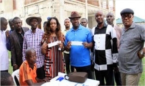 Rivers State Deputy Governor, Engr Tele Ikuru 3rd (right), his wife, Dr Mina Ikuru, displaying their membership registration cards shortly after registration in Ikuru Town, Ward 5 Andoi LGA, last Saturday. They are flanked from right to left by interim state chairman of APC, Chief Ibiamu Ikanya, Chairman APC Registration Committee for Rivers State, Engr Ebeitei Francis, Secretary of the committee, Mr Joseph Omorotionwal and Secretary, APC, Andoni LGA, Hon Kingston Sylvanus, 