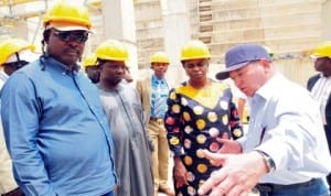 L-R: Chairman, Senate Committee on Water Resources, Sen. Heineken Lokpobiri, member of the Committee, Sen. Joshua Lidani, Chief Engineer, Ministry of Aviation, Mr Bayode Boluwaji, Minister of Water Resources, Mrs Sarah Ochekpe and Chief Engineer, SSC Nigeria Limited, Mr Etim Frank, during inspection of Kashimbilla multi-purpose dam in Taraba last Monday.