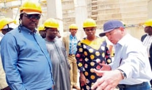 L-R: Chairman, Senate Committee on Water Resources, Sen. Heineken Lokpobiri, member of the  Committee, Sen. Joshua Lidani, Chief Engineer, Ministry of Aviation, Mr Bayode Boluwaji, Minister of Water Resources, Mrs Sarah Ochekpe and Chief Engineer, SSC Nigeria Limited, Mr Etim Frank, during inspection of Kashimbilla multi-purpose dam in Taraba last Monday.