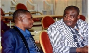 Deputy Speaker, Rivers State House of Assembly, Hon  Leyii Kwanee (left), conferring with Chairman, House Committee on Judiciary, Hon Golden Chioma, during the sitting of the House at Government House, Port Harcourt recently. 