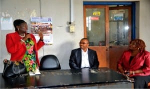 Permanent Secretary, Ministry of Information and Communications, Rivers State, Mrs Cordelia M. Peterside (left), addressing staff of Rivers State Newspaper Corporation, during her visit to the corporation last Wednesday. With her are General Manager, RSNC, Mr Celestine Ogolo and Director of Publications, Mrs Juliet Njiowhor.