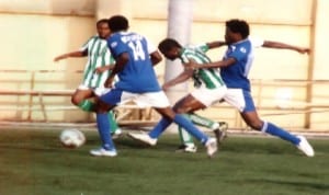 Dolphins players  trying to outsment Sharks players during a league match in Port Harcourt Rivers State recently. 