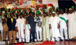 President Goodluck Jonathan (middle) flanked by officials and team members of the CHAN Super Eagles at the Presidential Villa, Abuja, yesterday