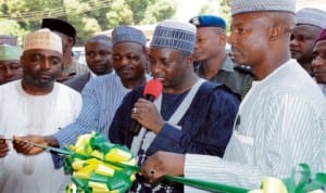 L-R: Director-General, Media and Publicity to the Governor of Kaduna State, Alhaji Ahmed Maiyaki, Commissioner for Commerce and Industry, Mr Joshua Uchissa, Governor Mukhtar Yero of Kaduna State and Chairman, Nigeria Union of Journalists, Kaduna State Council, Alhaji Yusuf Idris, during the inauguration of NUJ Shopping Complex in Kaduna last Thursday.