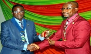 President, Nigeria Society of Engineers, Mr Ademola Olorunfemi (left), receiving an award from the National Chairman, Nigerian Institute of Mechanical Engineers, Prof. Adisa Bello, at the inauguration of the 11th National Chairman of the Nigerian Institute of Mechanical Engineers in Abuja last Wednesday.