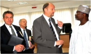 Head of European Union Delegation, Amb. Michel Arrion (2nd right), discussing with Chairman of INEC, Prof. Attahiru Jega (right), during a courtesy visit to INEC headquarters in Abuja last Friday. With them are EU First Secretary, Mr Alan Munday (left) and EU Minister Councellor (Political, Information and Communication), Mr Henry Prankerd.