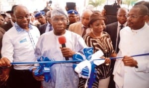 Former President Olusegun Obasanjo (2nd left), cutting the tape to commission Prof Kelsey Harrison Hospital in Diobu, Port Harcourt recently. With him are Rivers State Governor, Rt Hon Chibuike Amaechi (left), his wife, Dame Judith Amaechi and Rivers State Commissioner for Health, Hon Sampson Parker (right).