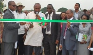 Rivers State Commissioner for Agriculture, Hon Emmanuel Chindah (2nd left) cutting the tape to commission the Eleme Agricultural Support Centre built by Rivers State Sustainable Development Agency (RSSDA). Executive Director, RSSDA, Noble Pepple (left), Vice Chancellor, Rivers State University of Science and Technology, Prof Barineme Fakae (2nd right) hold the tape while others watch